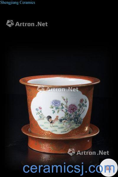In the 19th century A cylindrical flower bowl decorated with shaped panels enclosing cockerels and quails amongst flowers enamelled in Famille Rose, against A vibrant coral ground embellished with gilt floral motifs, with matching stand, each with apocryphal Qianlong se