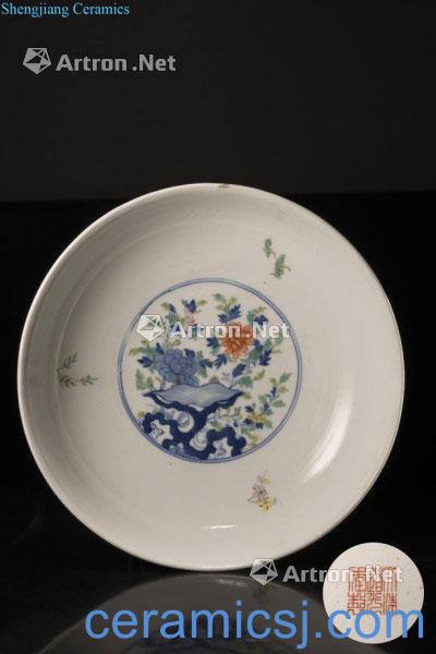 In the second half of the 19th century,/the first half of the 20th century A doucai bowl, decorated to the exterior with peony and by, the interior with A central roundel with flowers and pierced rocks, apocryphal Daoguang mark to the base