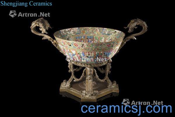 In the 19th century A large Cantonese Famille Rose bowl decorated in gilt and enamels with figures in interior scenes on A rich floral ground losses), (with an ormolu base