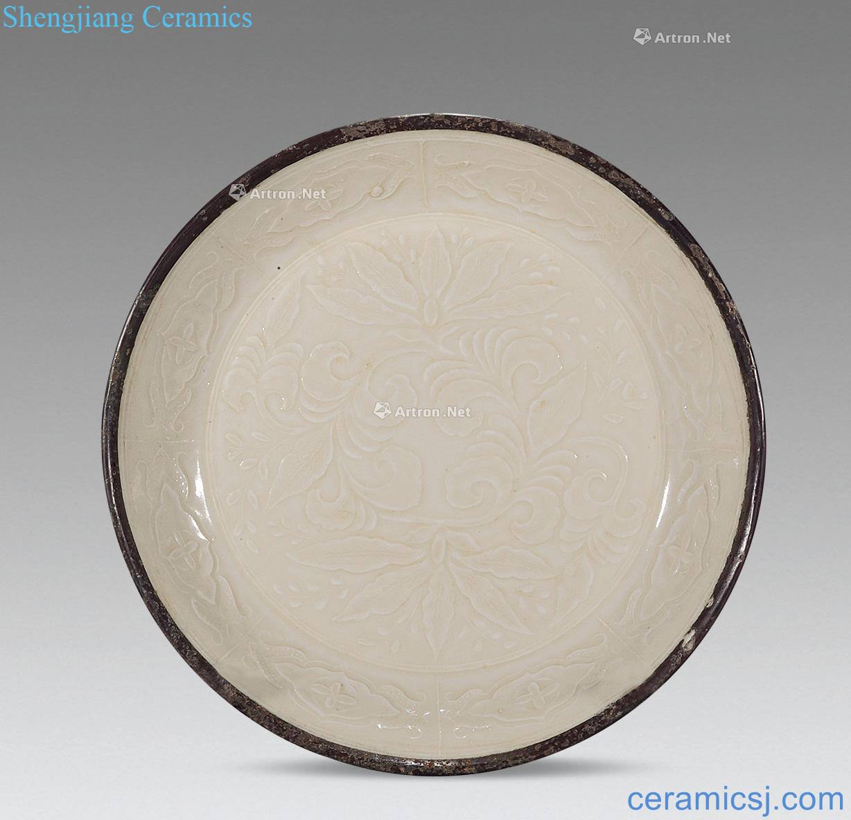 Ming or earlier Kiln carved peony faceplate