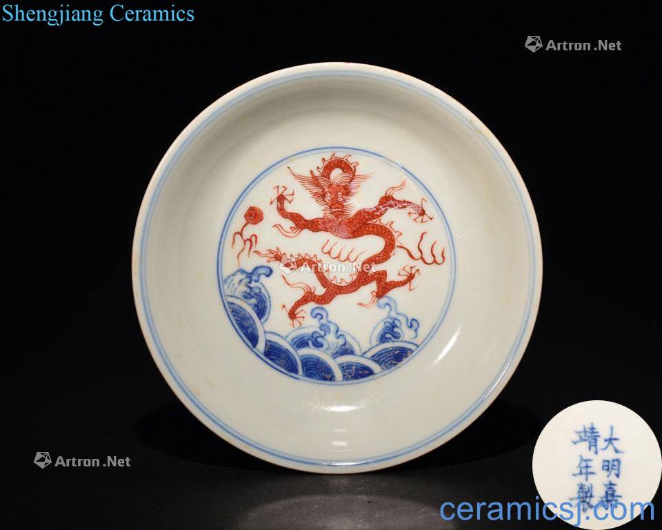 MING DYNASTY A COPPER - RED, BLUE AND WHITE DRAGON DISH