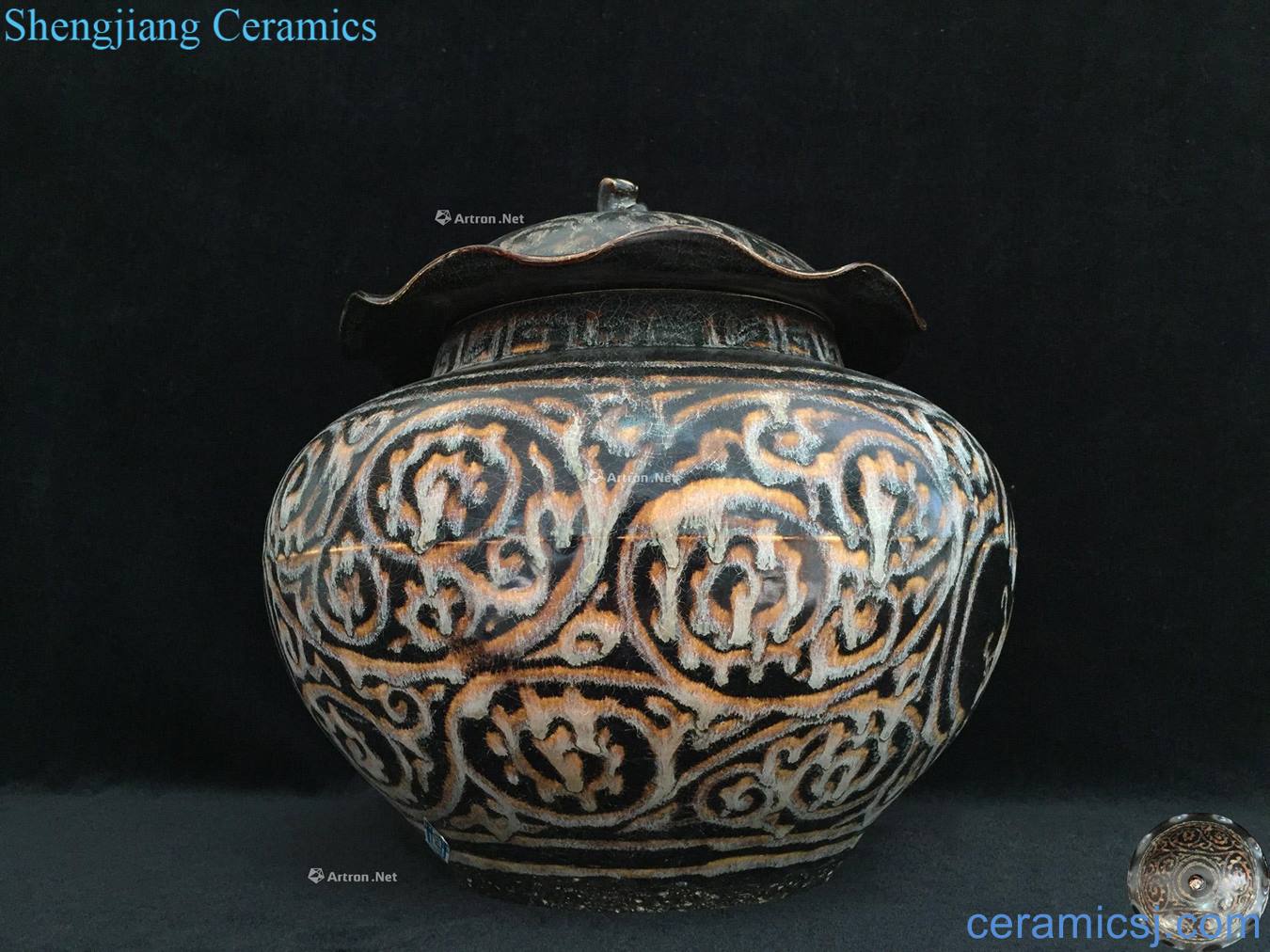 The song dynasty Jizhou kiln dragon lotus leaf cover tank