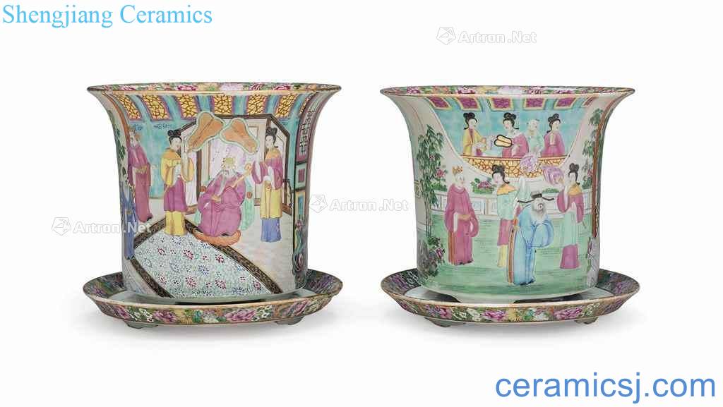In the 19th century A PAIR OF CANTON FAMILLE ROSE JARDINIERES AND STANDS