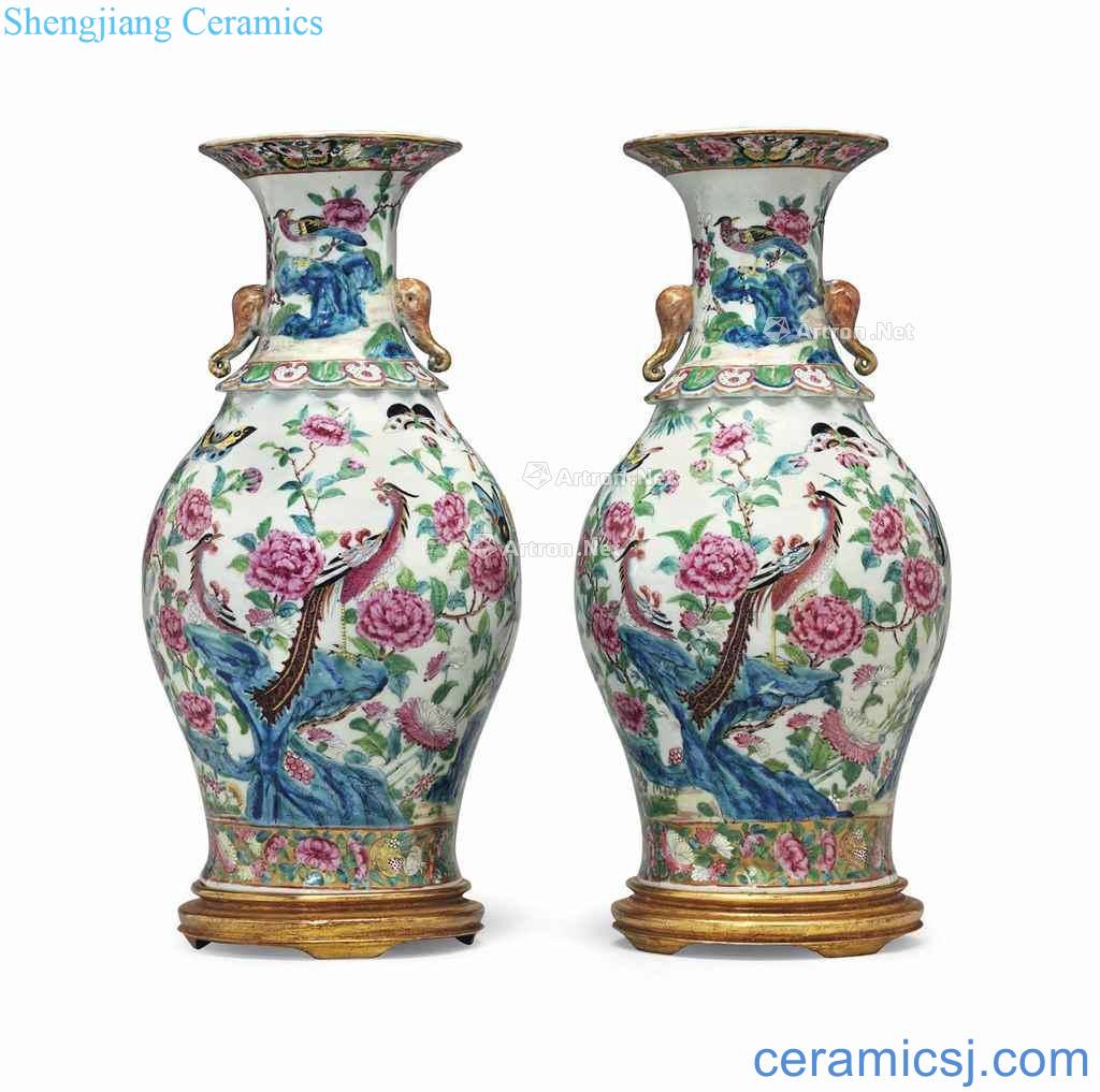 In the 19th century A PAIR OF CANTON FAMILLE ROSE VASES