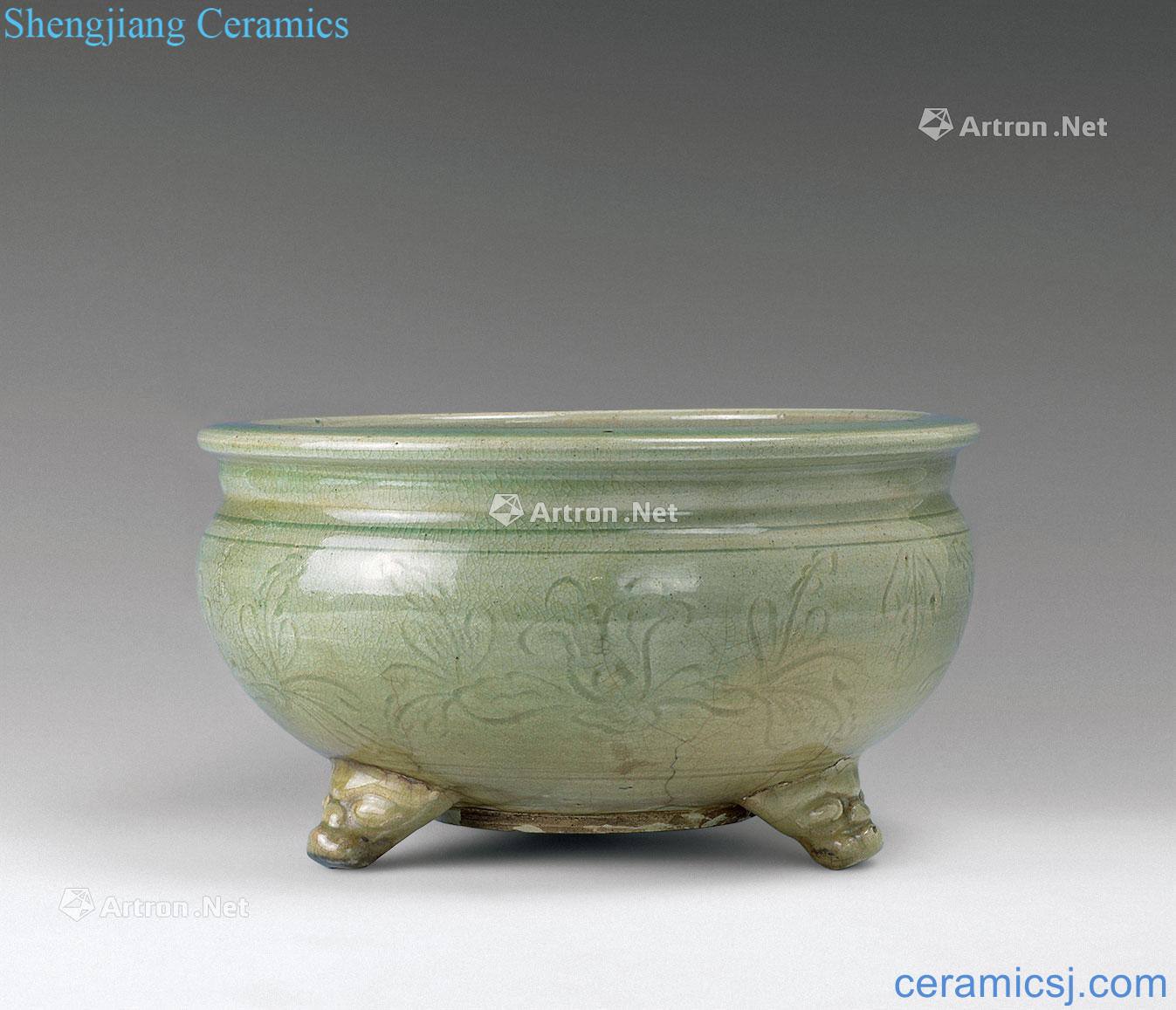 In the Ming dynasty Longquan celadon engraved floral print three beast foot incense burner