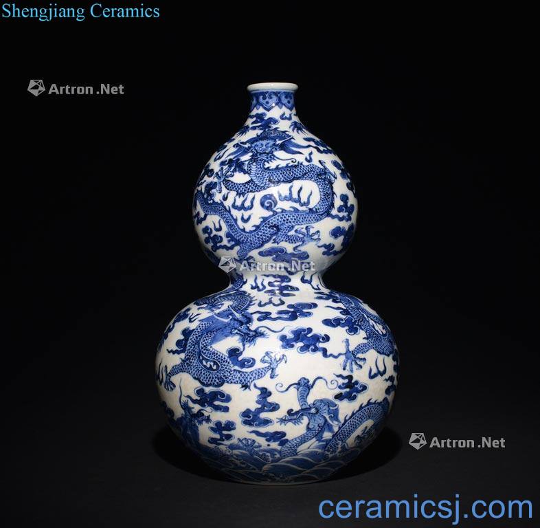 The Qing Dynasty A BLUE AND WHITE DOUBLE - GOURD DRAGON VASE