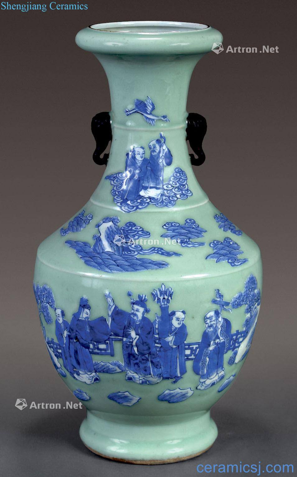 The pea green vase with a blue and white people object