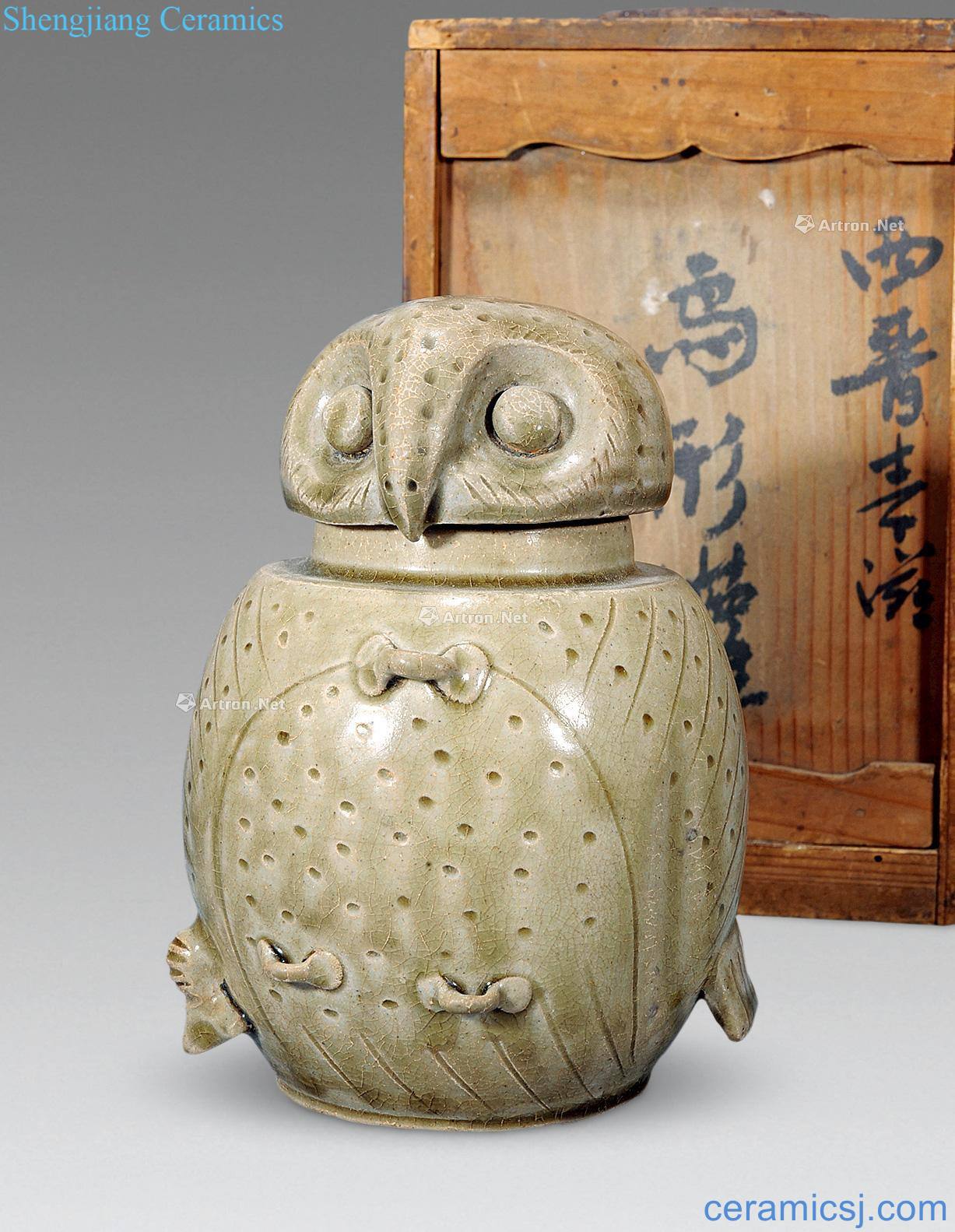 Ming or earlier celadon owl shape in a bottle