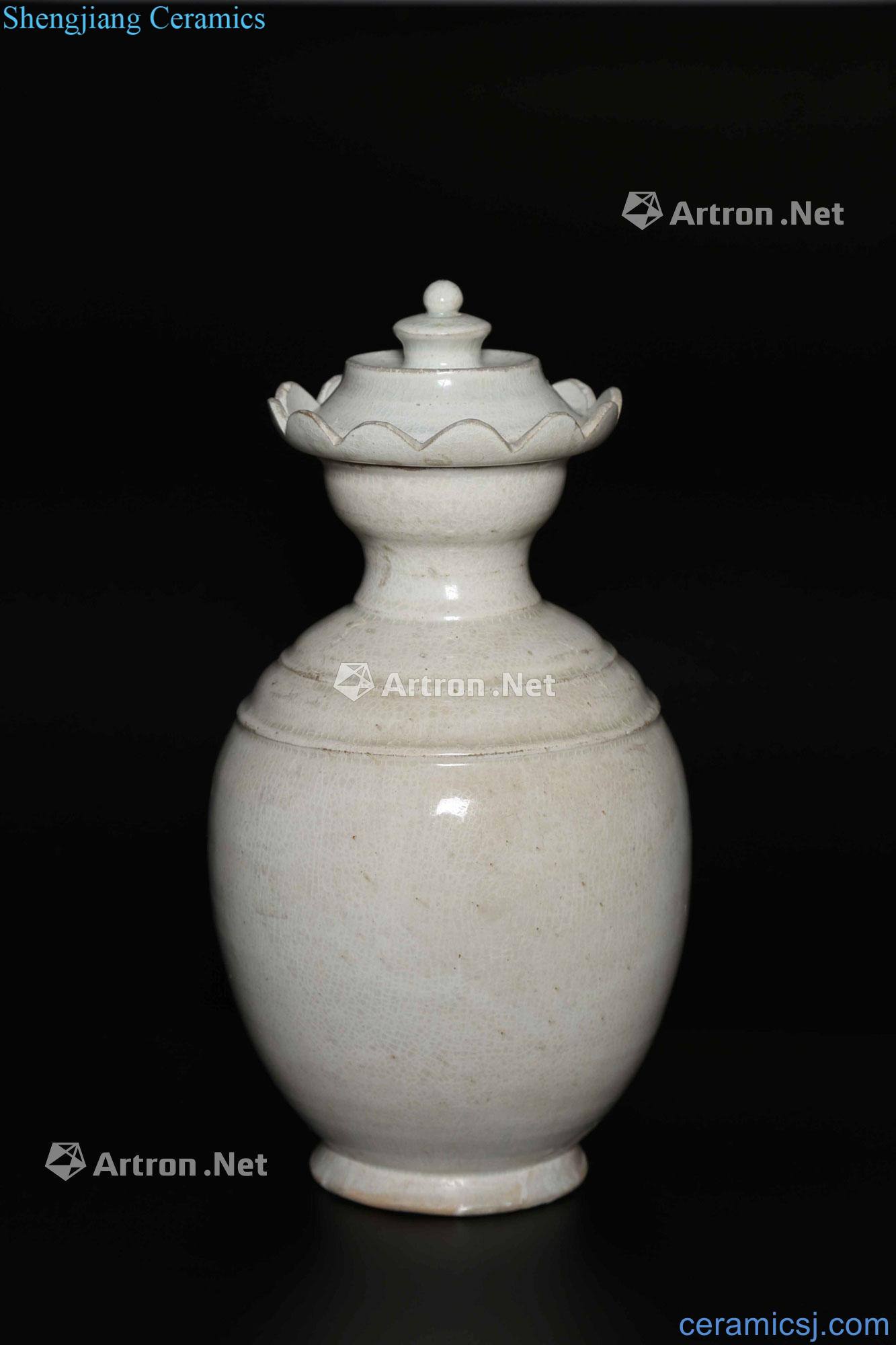 Song dynasty A PALE GLAZED STONEWARE VASE WITH LID to CHINA