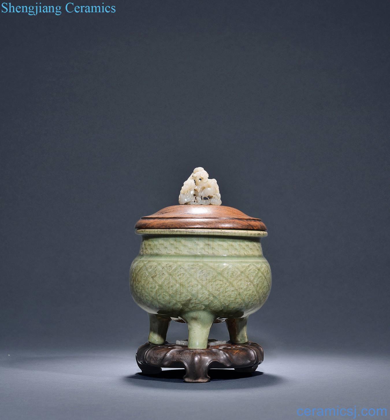 Ming dynasty Longquan celadon brocade furnace with three legs