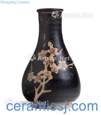 The southern song dynasty/yuan Jizhou kiln paper-cut decals plum flower grain bottle