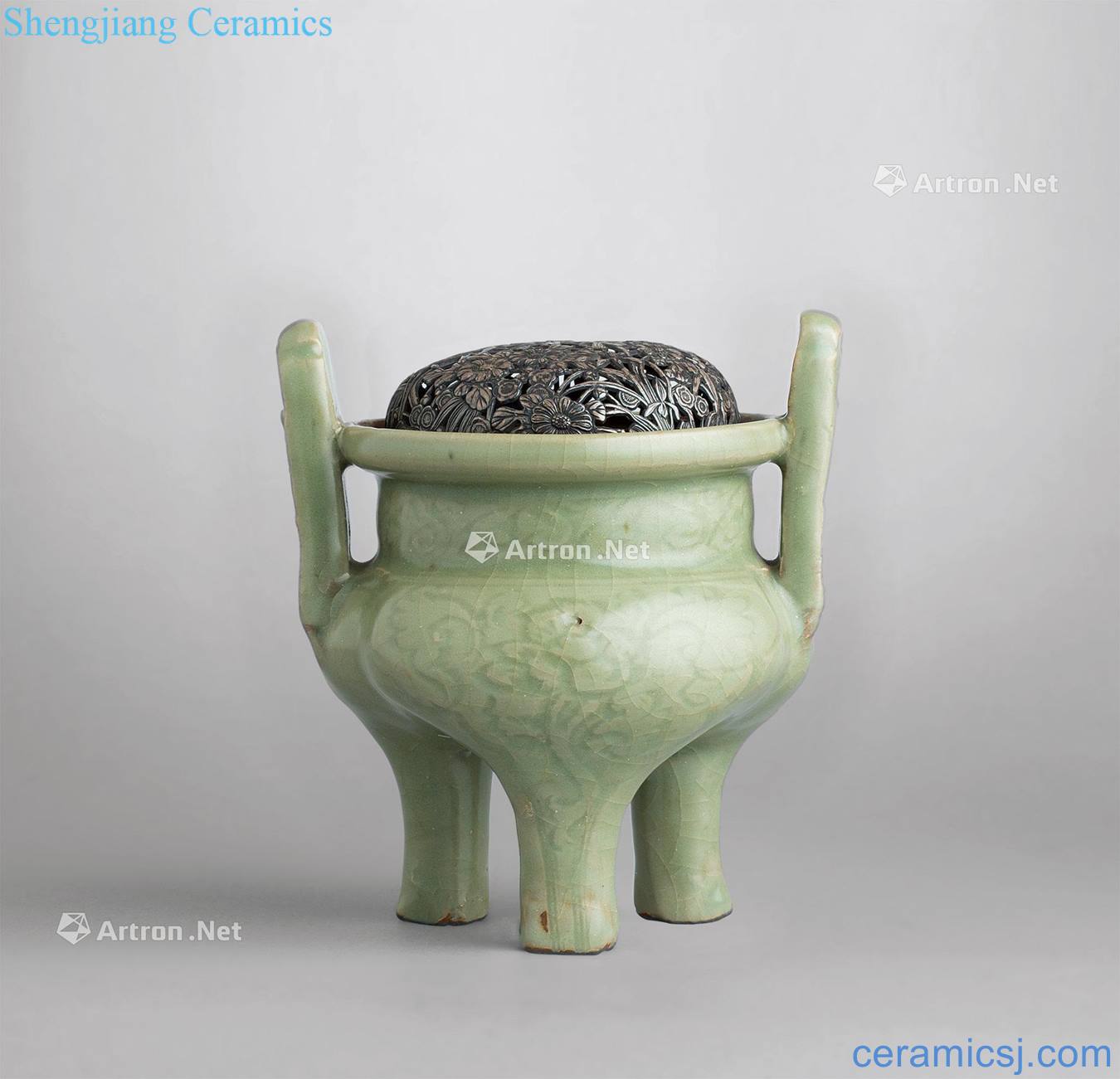 The yuan dynasty Celadon ears furnace with three legs