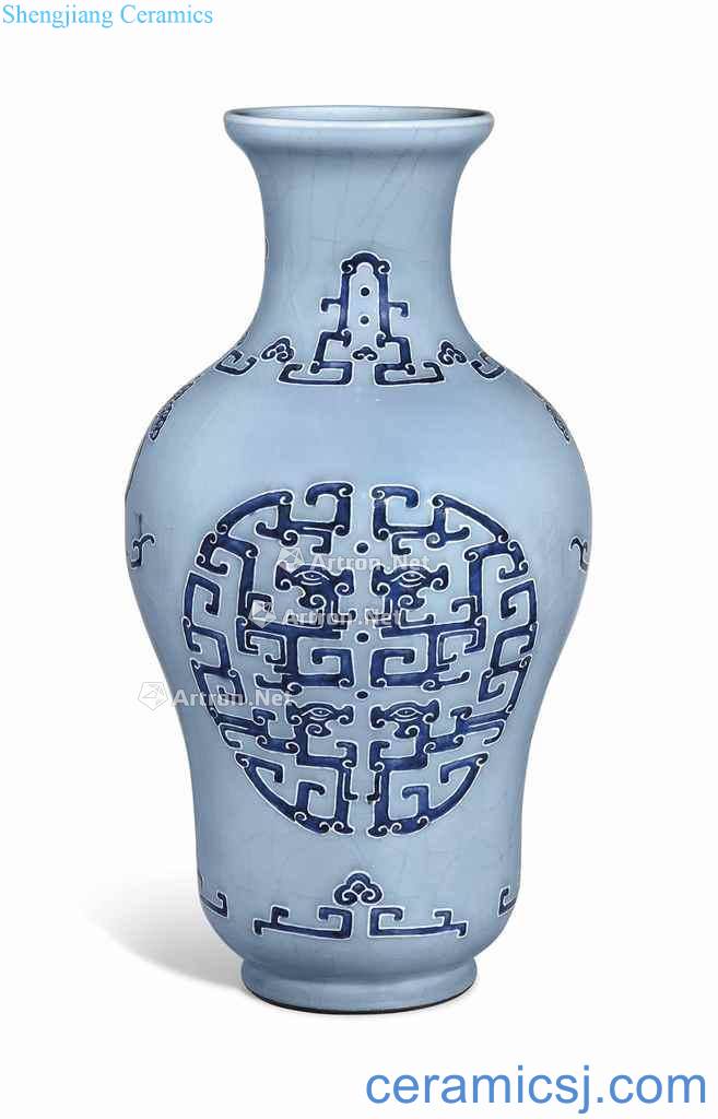 The qianlong period (1736-1795). A BLUE - GLAZED MOULDED VASE