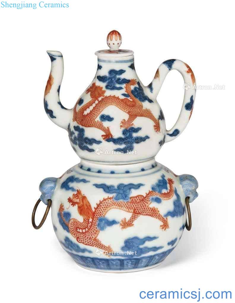 In the 19th century A TWO - PART BLUE AND WHITE AND IRON RED - DECORATED 'DOUBLE - GOURD WINE - WARMER AND COVER