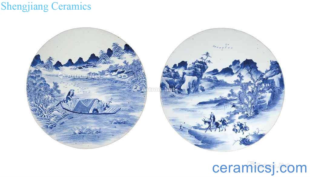 In the 19th century TWO BLUE AND WHITE CIRCULAR 'LANDSCAPE' PLAQUES