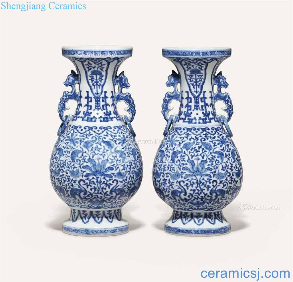 A PAIR OF BLUE AND WHITE VASES "LOTUS"