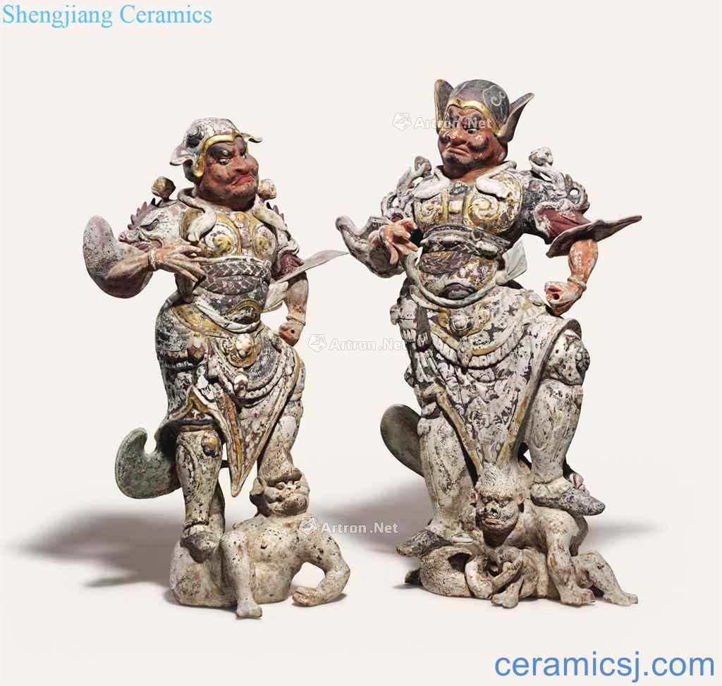 The tang dynasty (618-907), A RARE PAIR OF made the AND GILDED POTTERY FIGURES OF LOKAPALAS