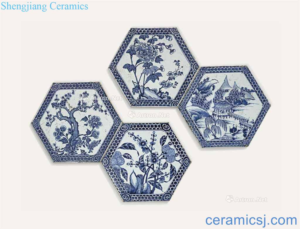 In the 18th century A GROUP OF FOUR BLUE AND WHITE HEXAGONAL TILES