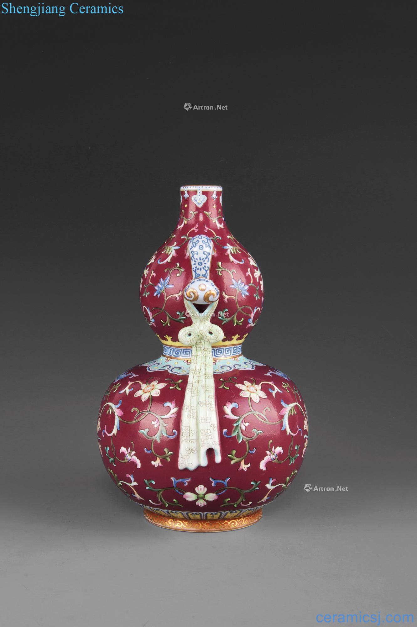 Qing qianlong official kiln enamel flower ruyi ear gourd bottle wrapped branches