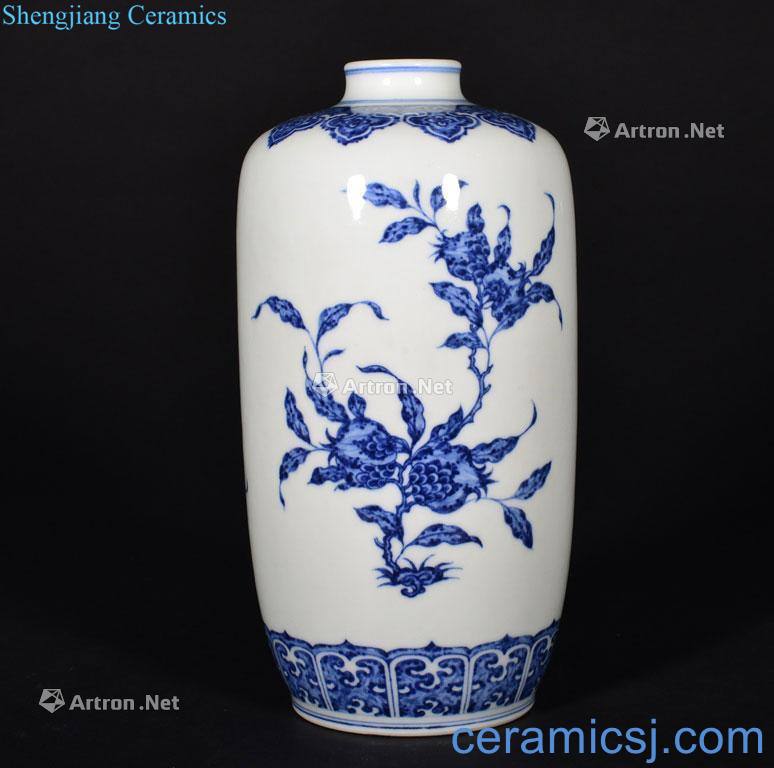 The Qing Dynasty A BLUE AND WHITE FRUIT VASE