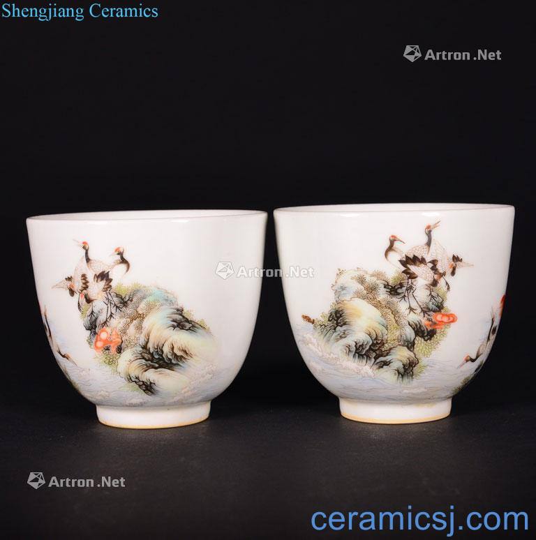 The Qing Dynasty A PAIR OF FAMILLE ROSE CUPS