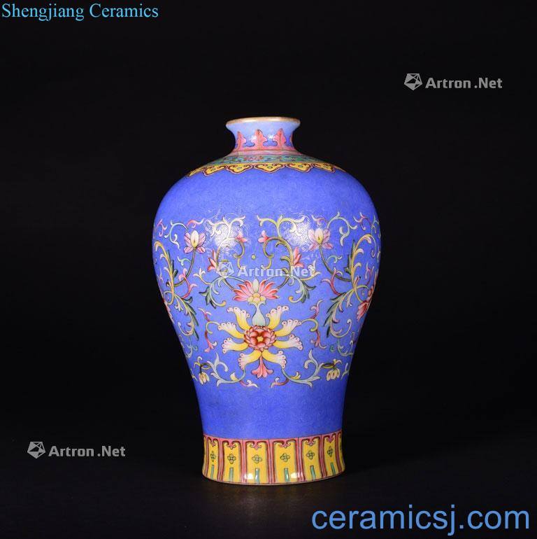 The Qing Dynasty A TURQUOISE - GROUND FAMILLE ROSE VASE