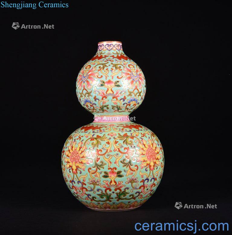 The Qing Dynasty A FAMILLE ROSE - DOUBLE - GOURD VASE