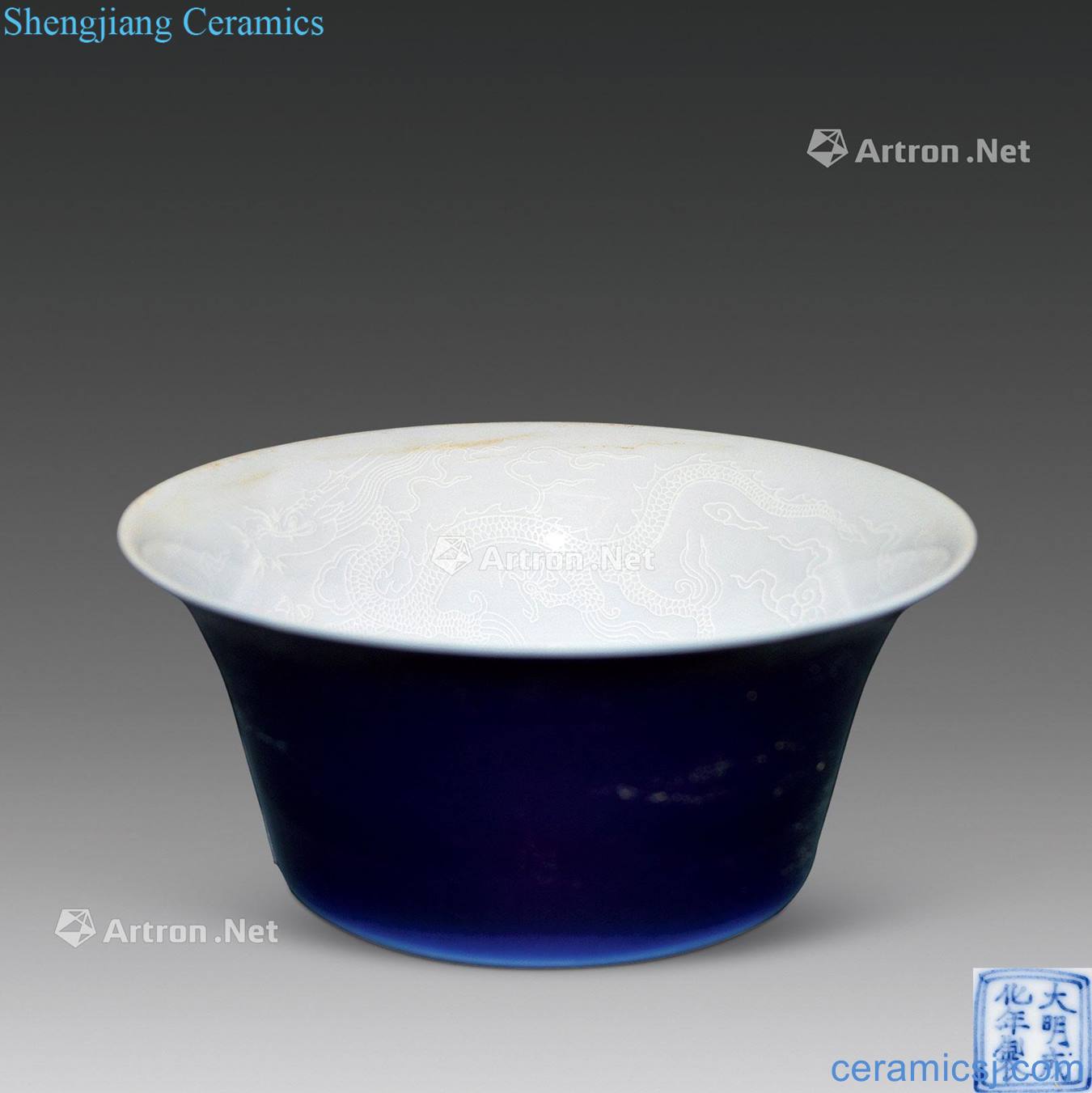 in The dark blue glaze carved dragon or cup