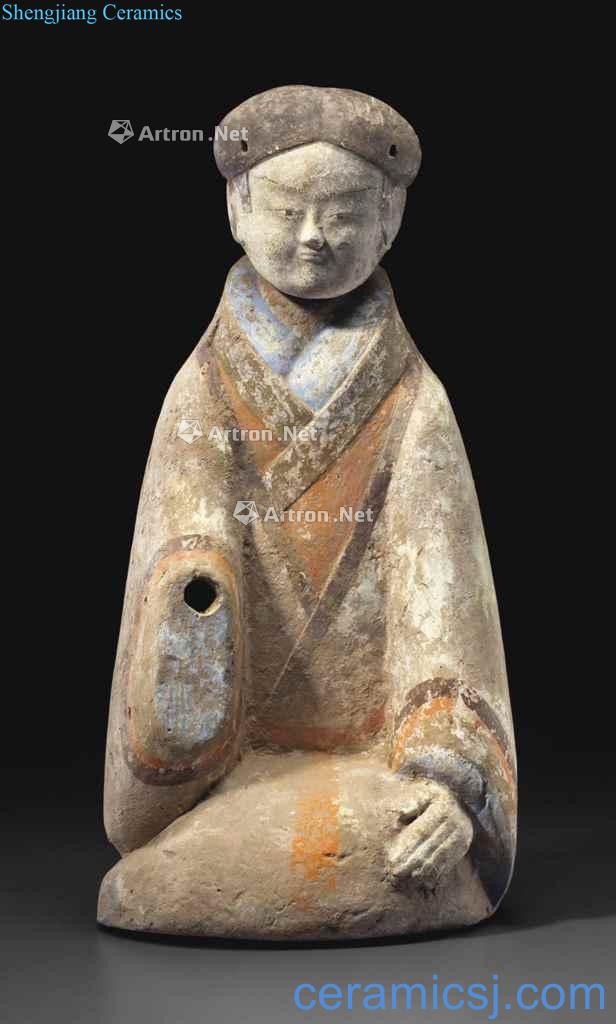 Han painted pottery RenYong on his knees