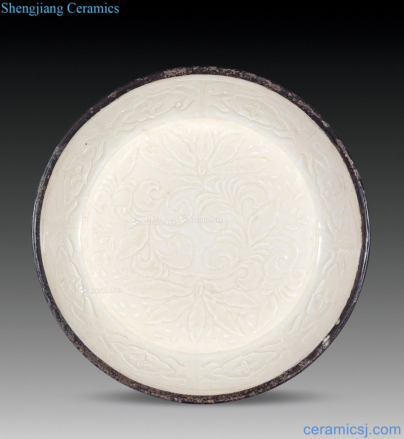Ming or earlier Kiln carved peony faceplate