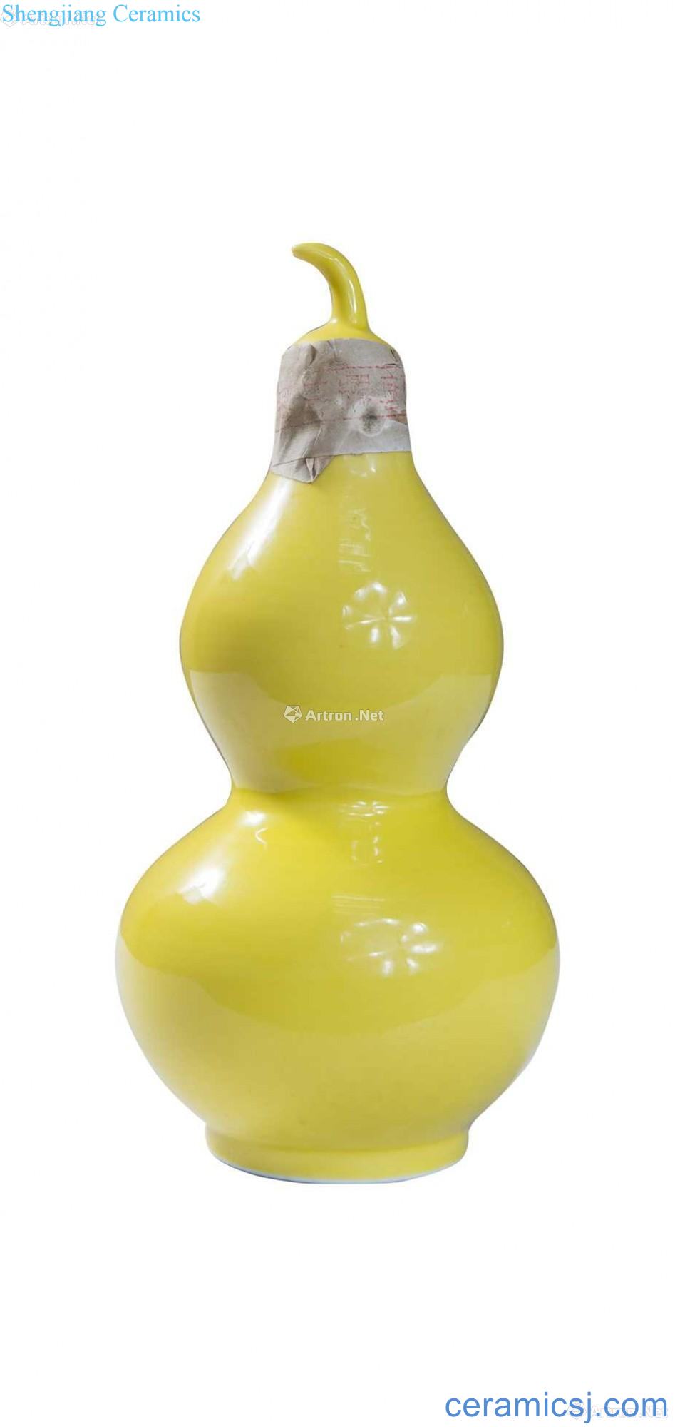 Yellow glaze with cover the gourd bottle