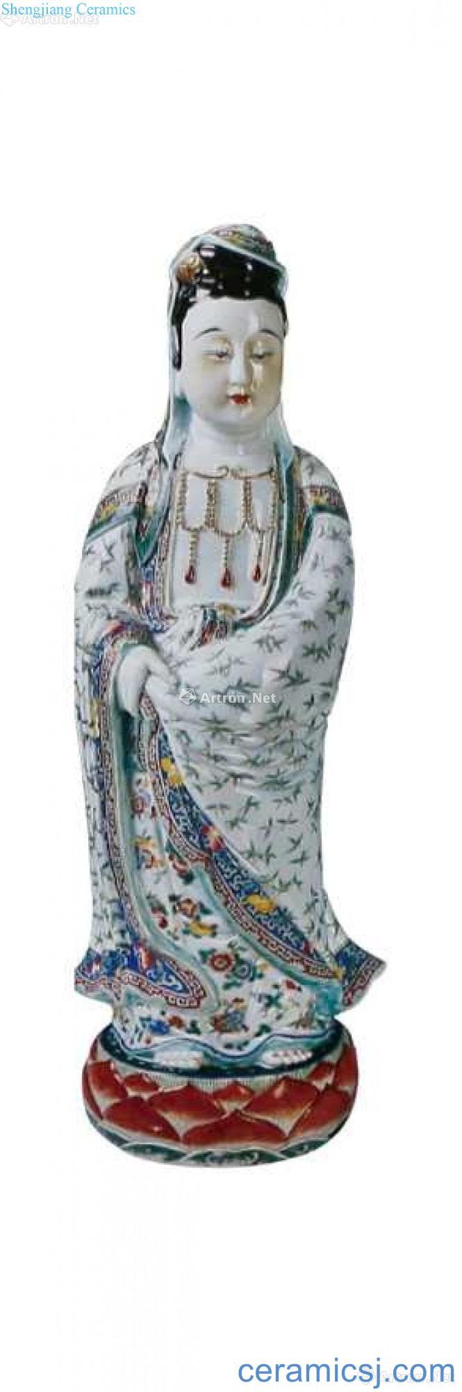 Pastel guanyin stands resemble