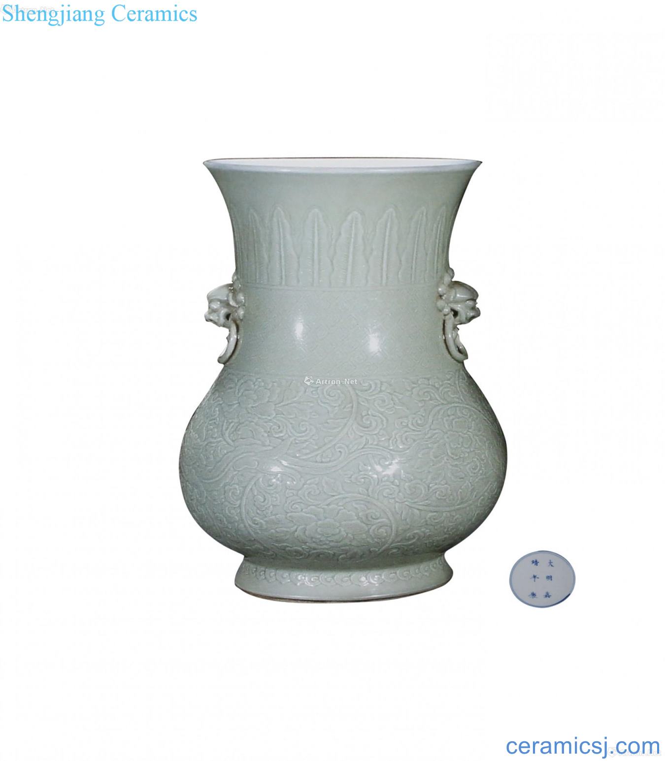 Pea green glaze vase with a double lion