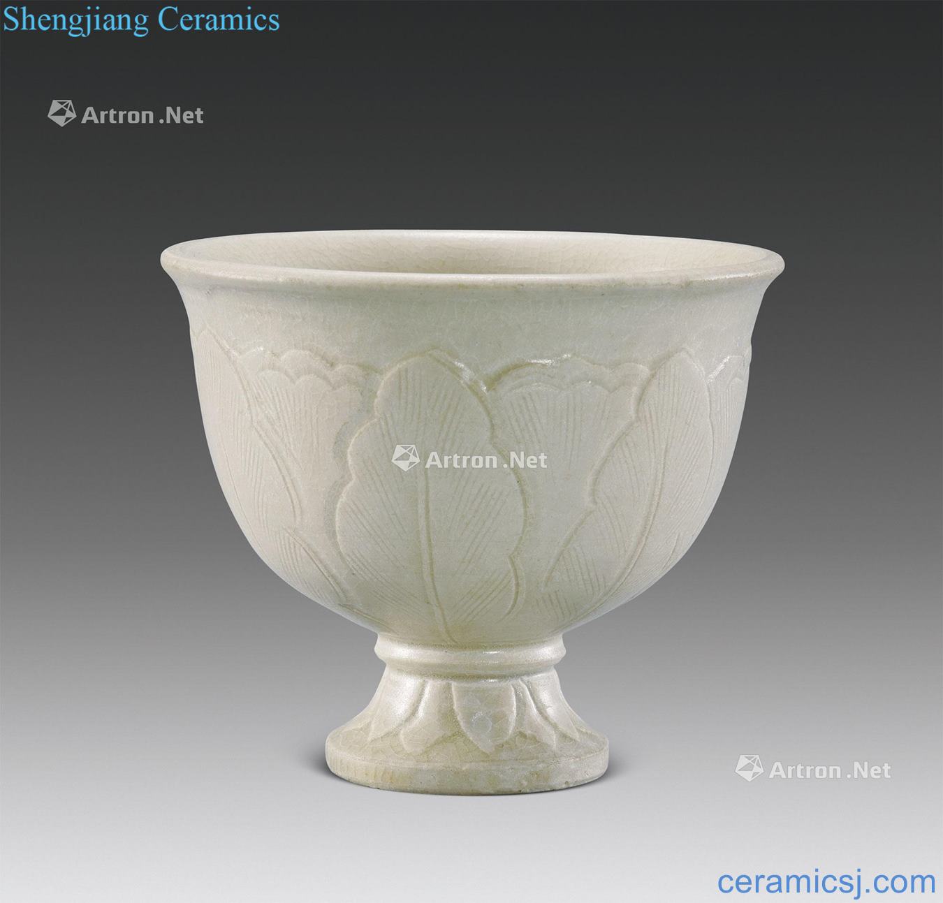 The tang dynasty White porcelain carved lotus cup