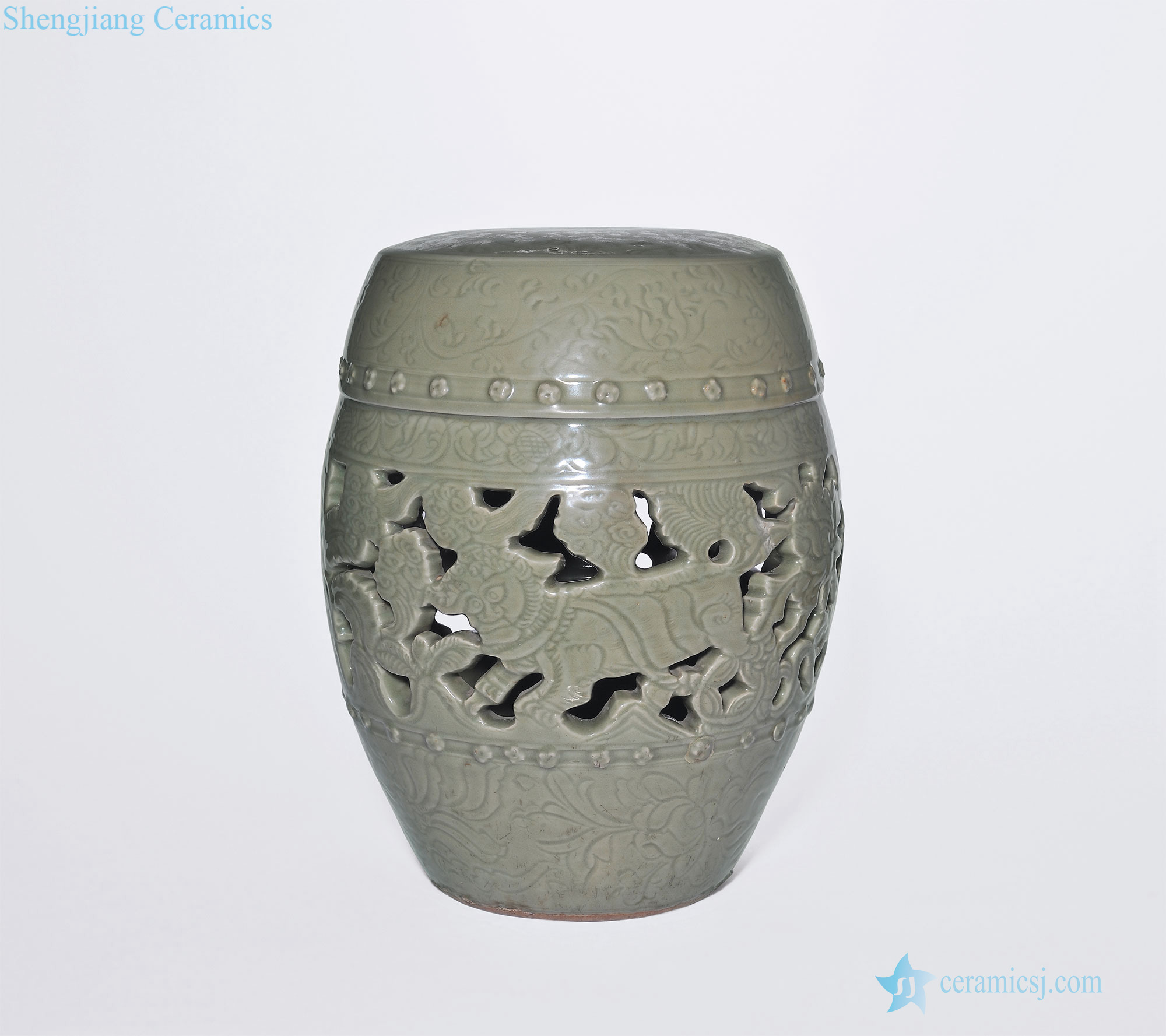 Ming dynasty Longquan celadon green glaze engraved look wearing flowers lion grain drum pier