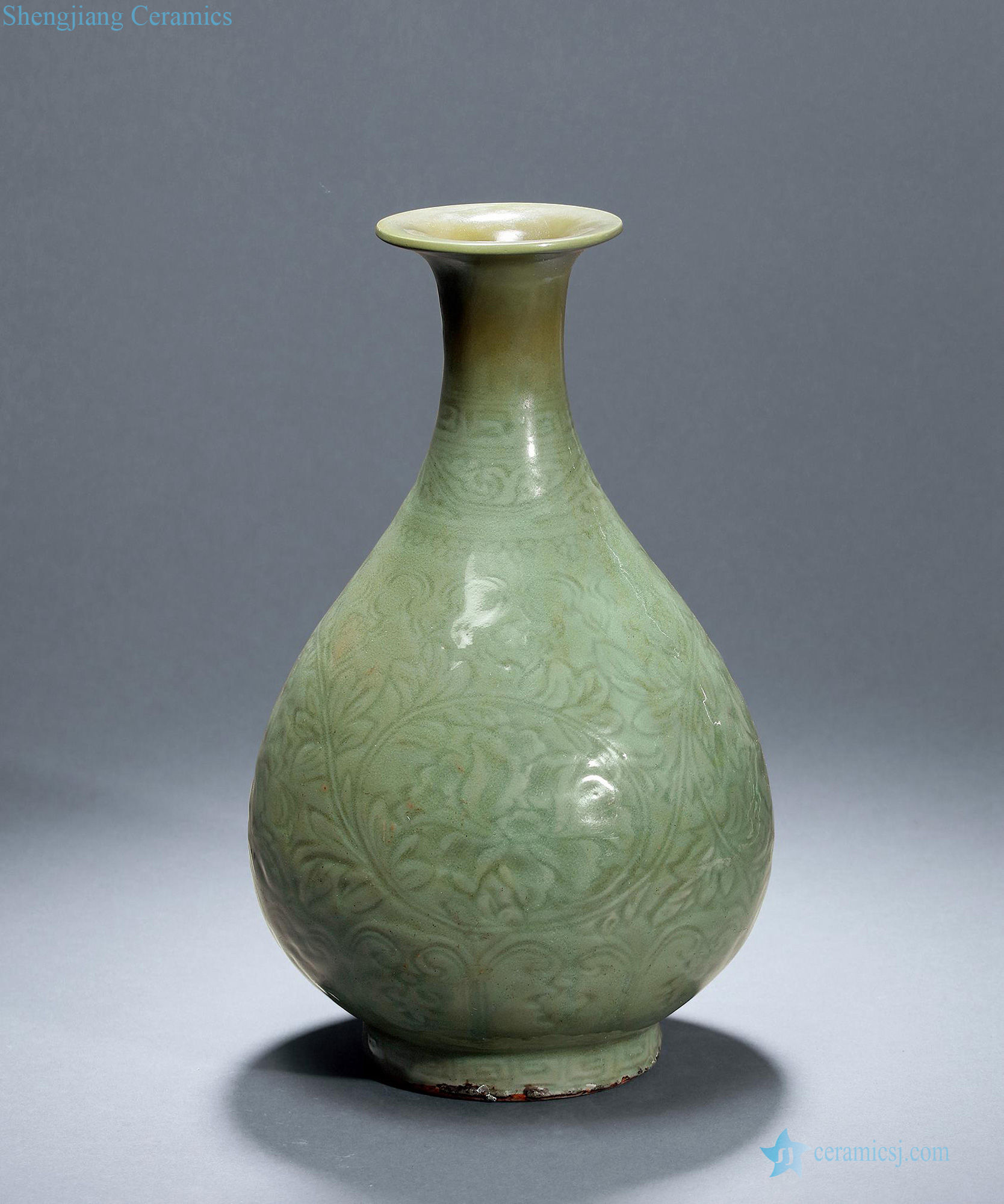Longquan celadon carved flowers around branches in early Ming dynasty okho spring bottle