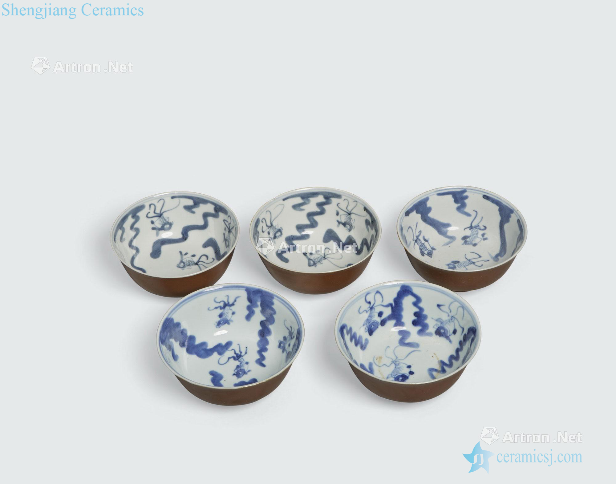 The Qing dynasty A GROUP OF FIVE BROWN GLAZED BOWLS WITH UNDERGLAZE BLUE DECORATION