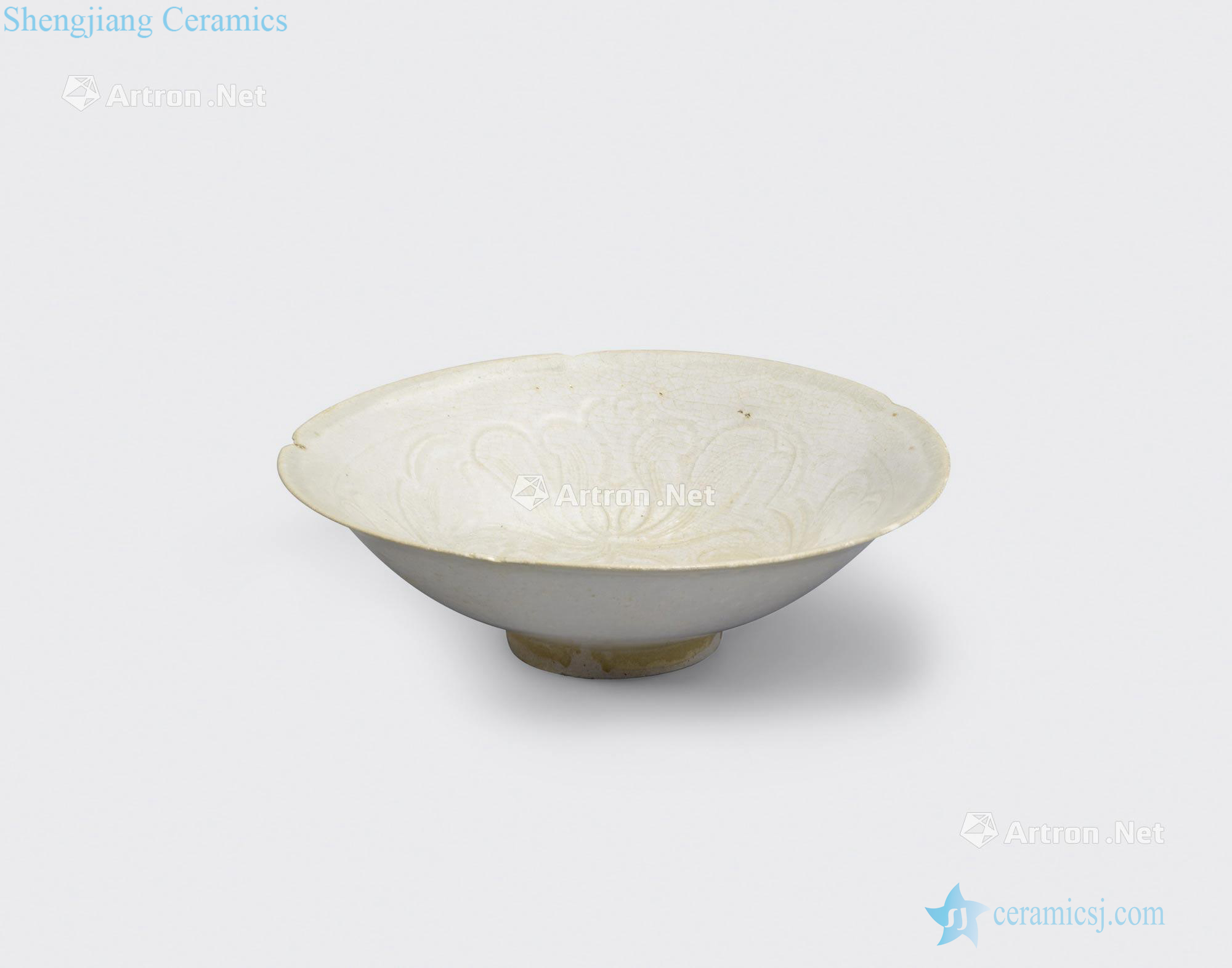 Ly - Tran dynasties, 12 th/13 th century A CREAM GLAZED BOWL WITH CARVED DECORATION