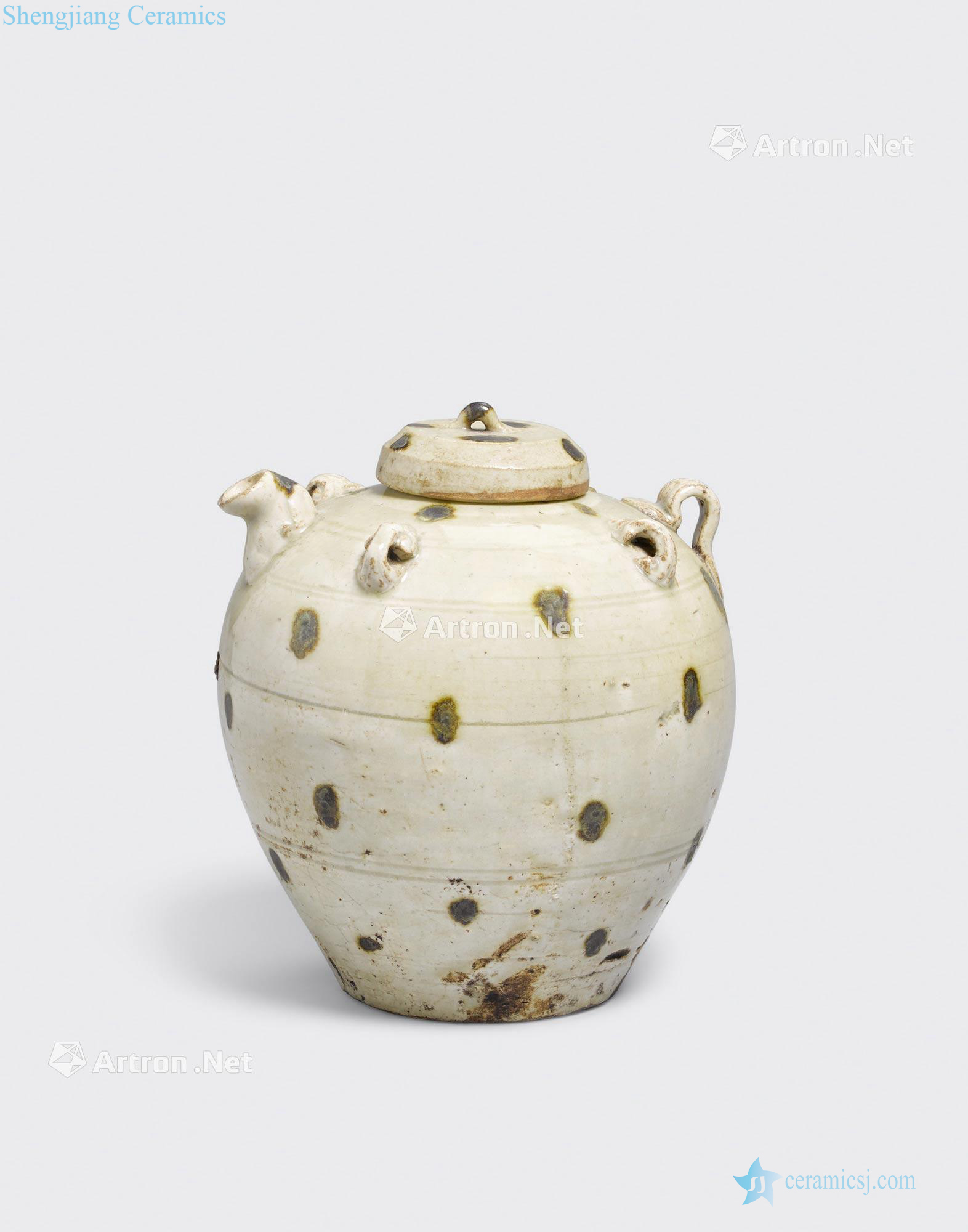Tran dynasty, 13 th/14 th century A SPOTTED CELADON EWER AND LID