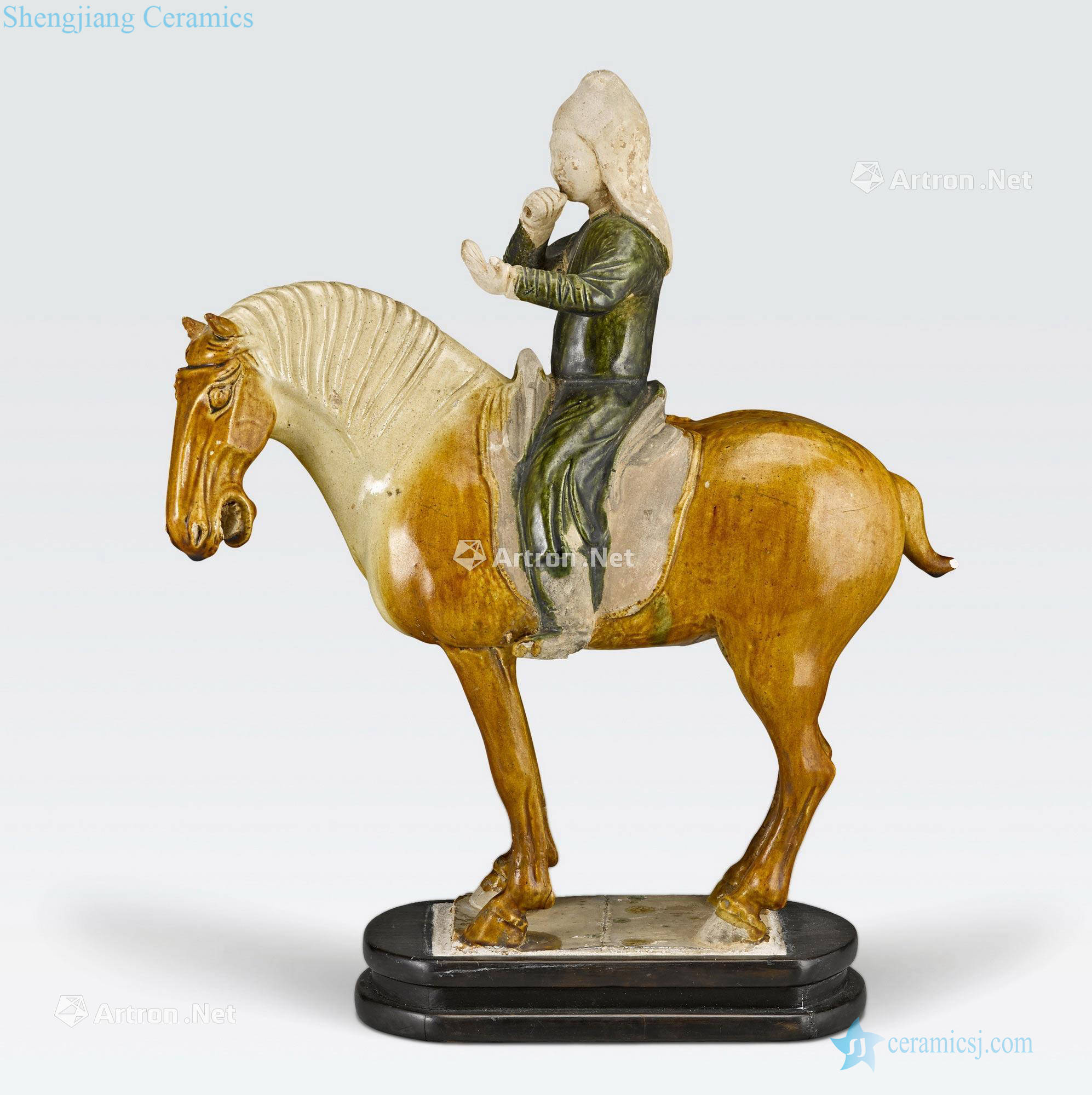 Tang dynasty A SANCAI GLAZED POTTERY HORSE AND RIDER