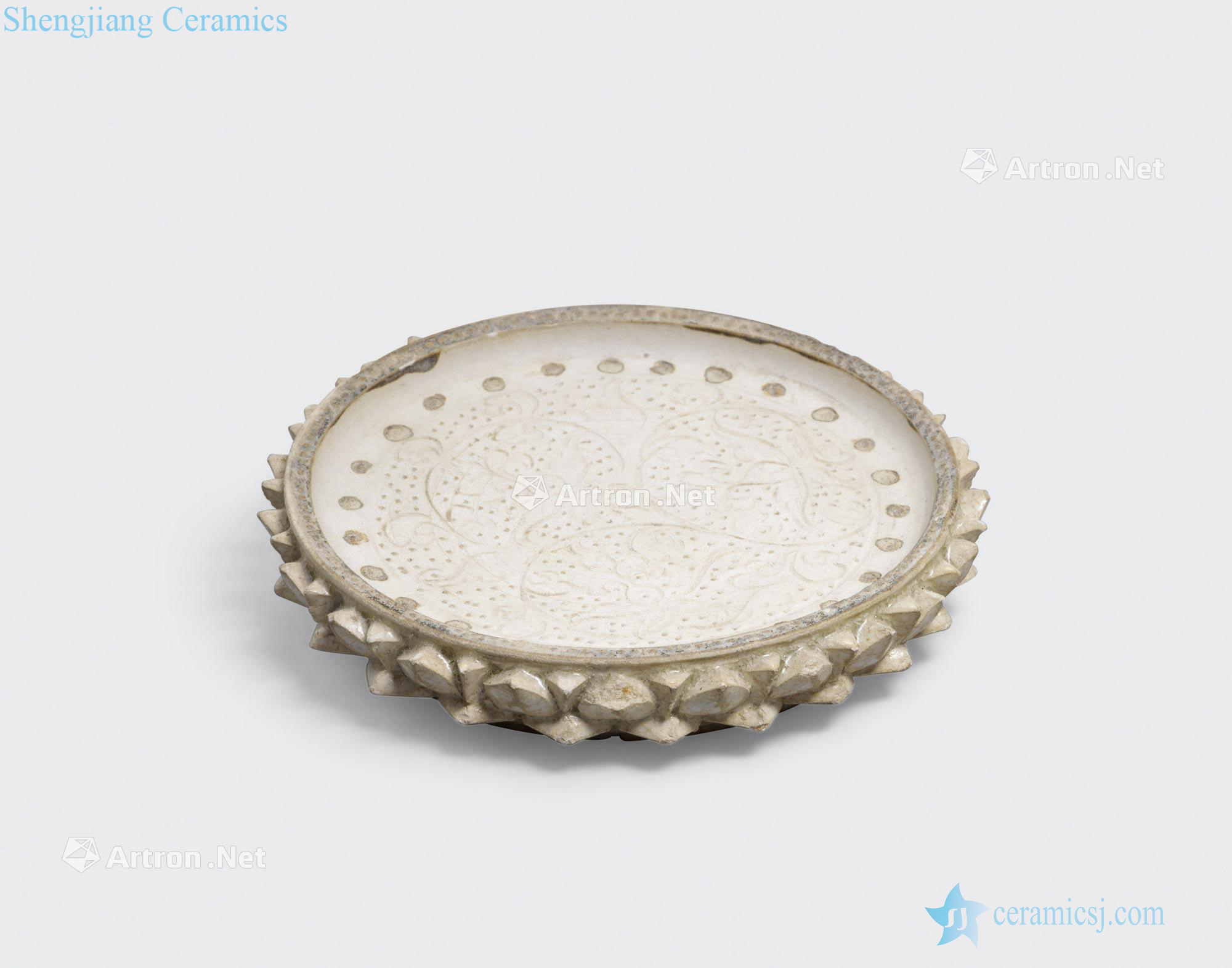 Ly dynasty, 11 th - 13 th century A SMALL LOTUS - PETAL DISH WITH INCISED DECORATION