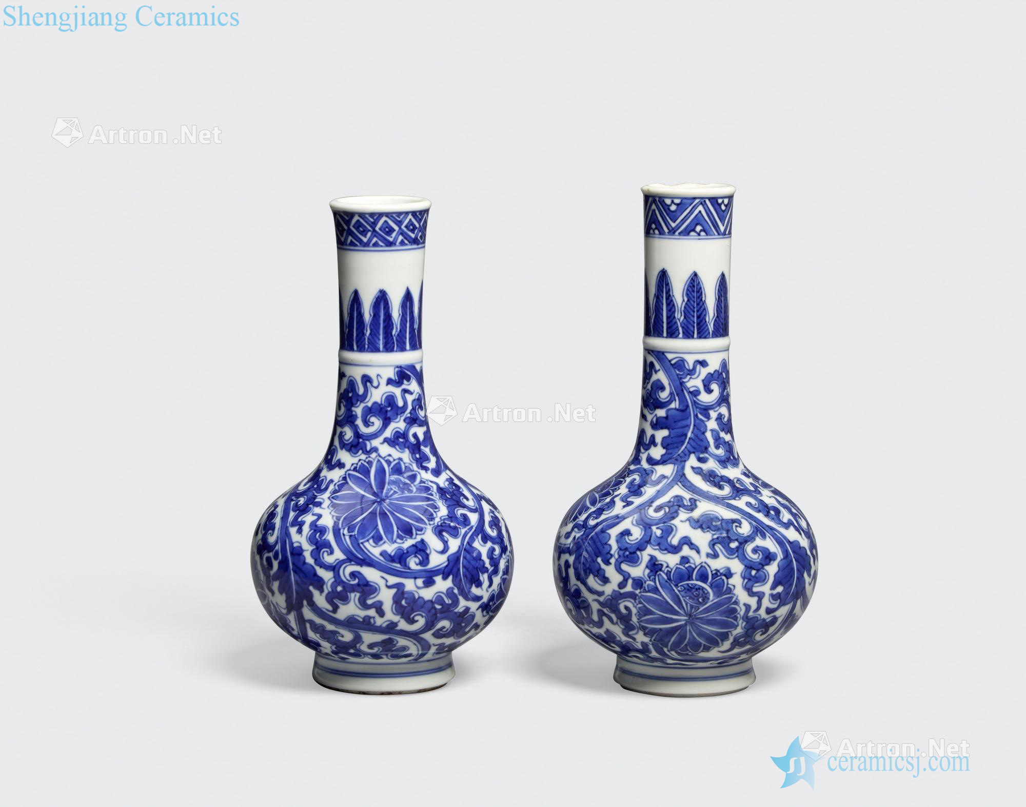 Kangxi period TWO BLUE AND WHITE STICK 'LOTUS' NECK VASES