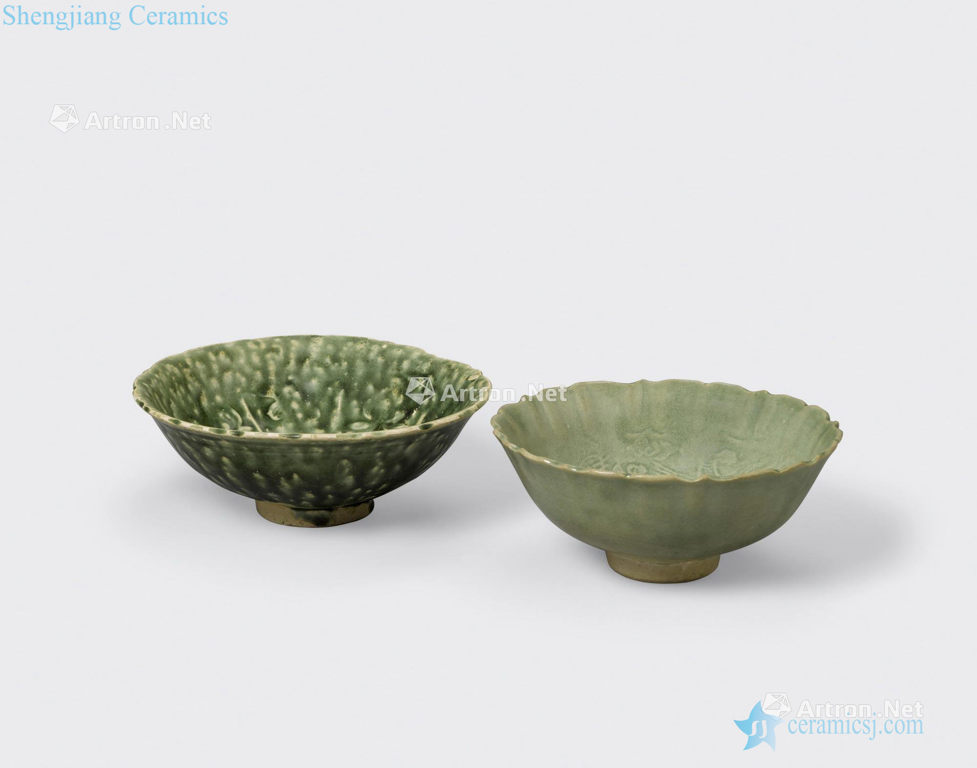 Tran - Le dynasties, 14 th/15 th century TWO GREEN GLAZED BOWLS WITH UNGLAZED STACKING RINGS