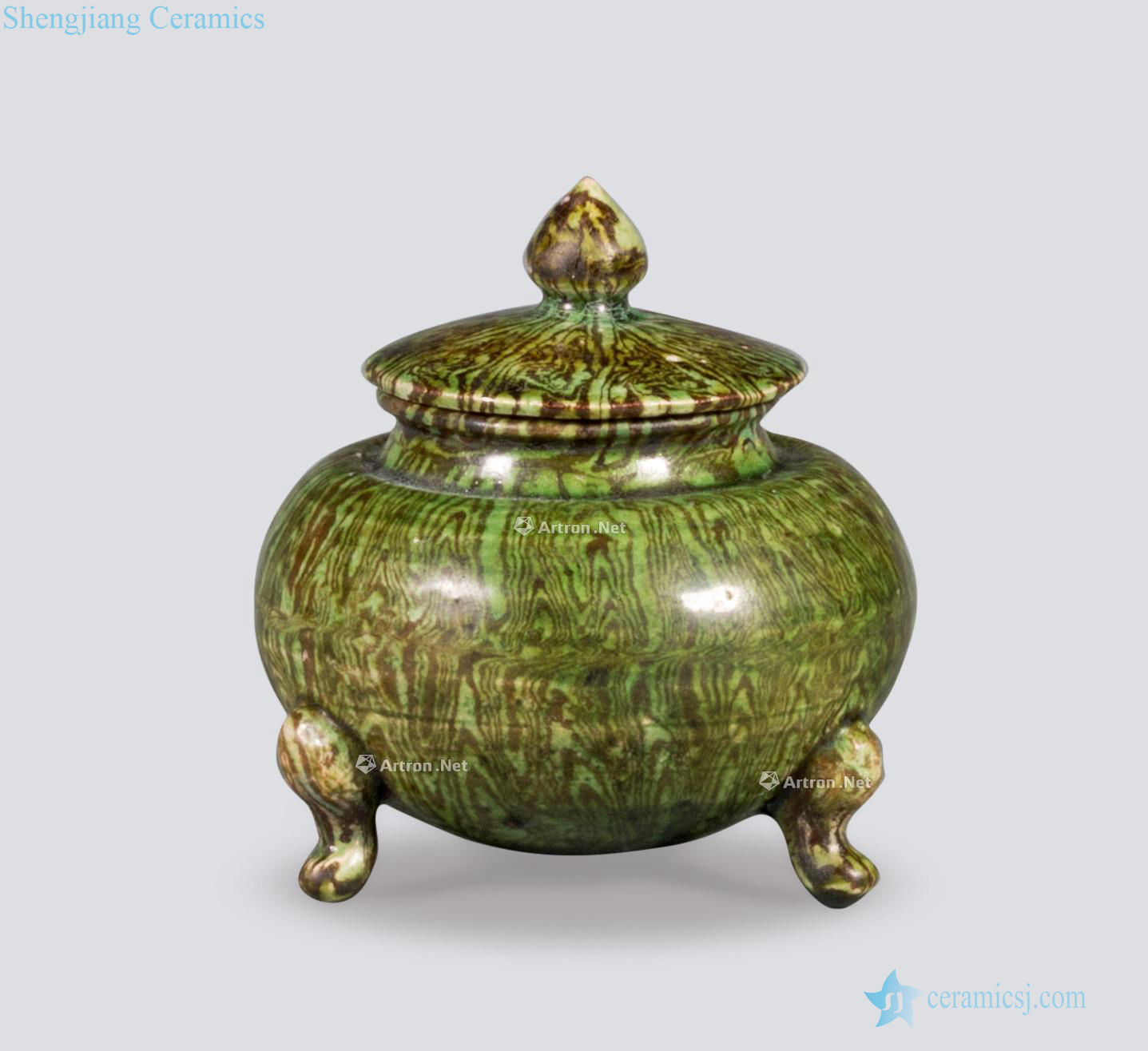 Tang green glaze twisted placenta furnace with three legs