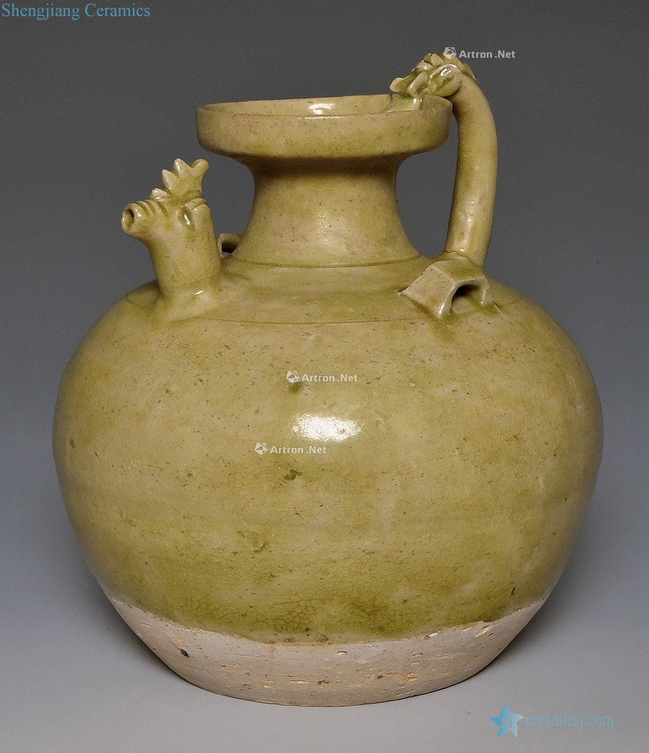Northern and southern dynasties, the kiln green glaze tail of dragon handle pot