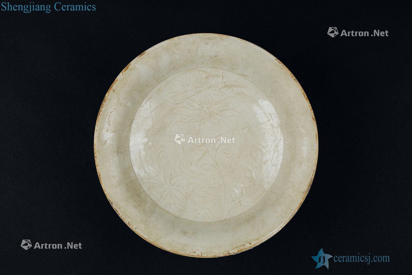 The song dynasty (960-1279) kiln porcelain carved lotus tray