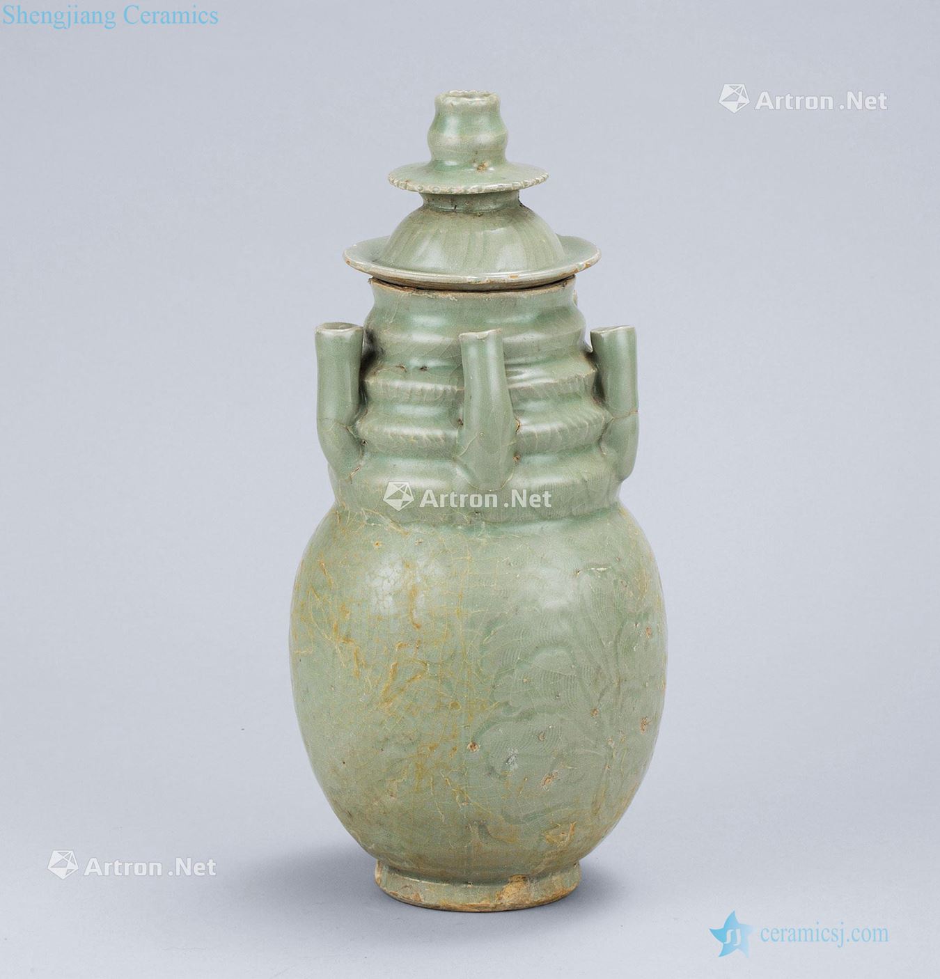 Northern song dynasty (960-1127), longquan celadon celadon carved flower grain five hole cover bottle