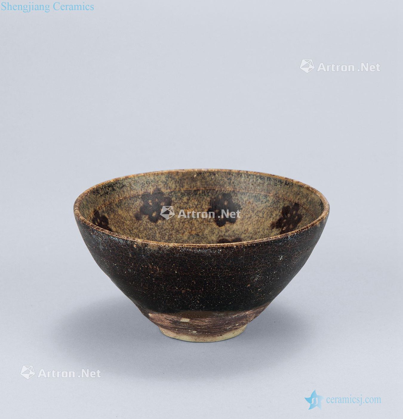 The song dynasty (960-1279), jizhou kiln paper-cut decals plum flower tattoos temmoku bowl