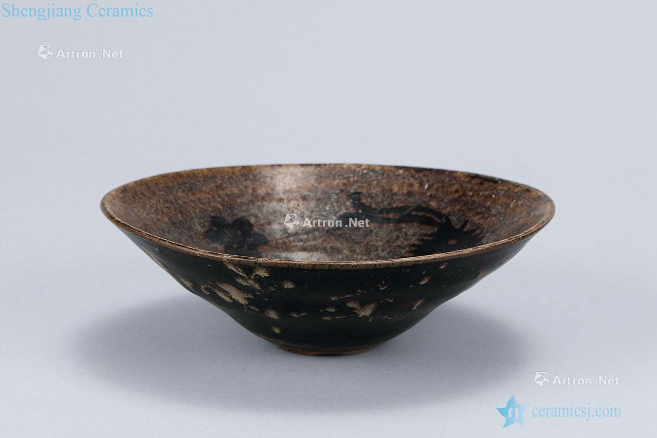 The song dynasty (960-1279), jizhou kiln paper-cut decals double phoenix plum green-splashed bowls