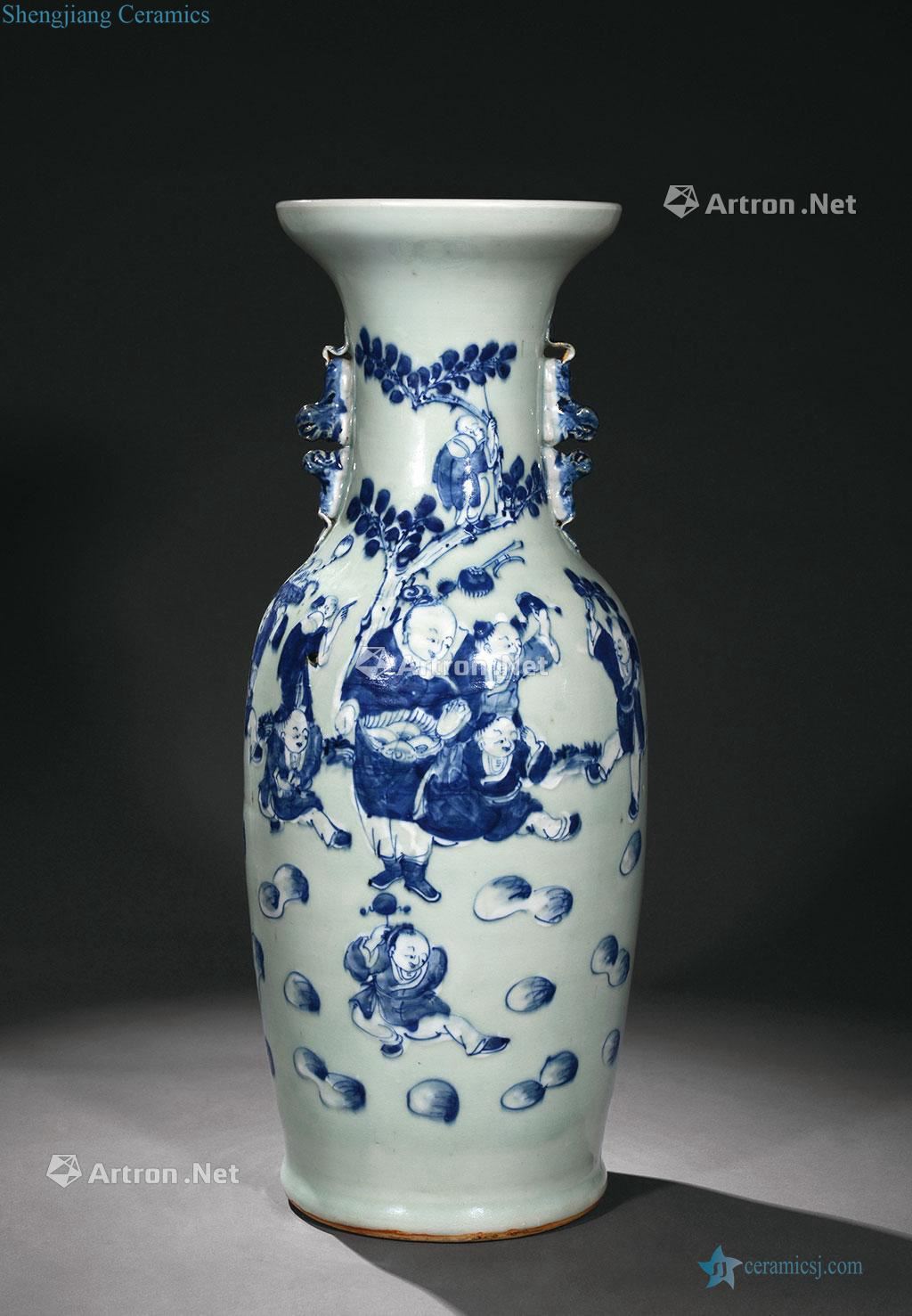The pea green blue and white vase with a baby lion play